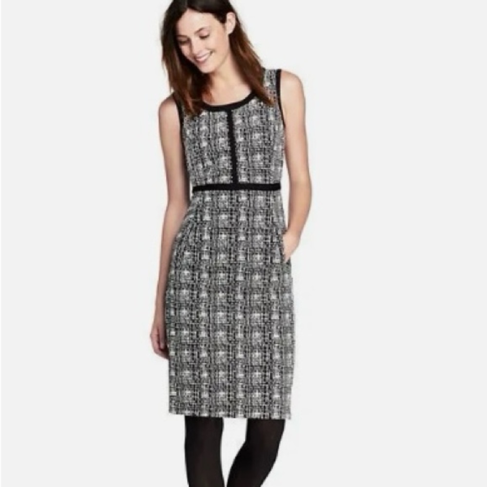 Fabulous jacquard patterned dress in abstract B&W plaid with black trim.